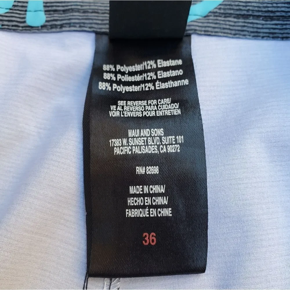 Maui and Sons blue gray and black board shorts